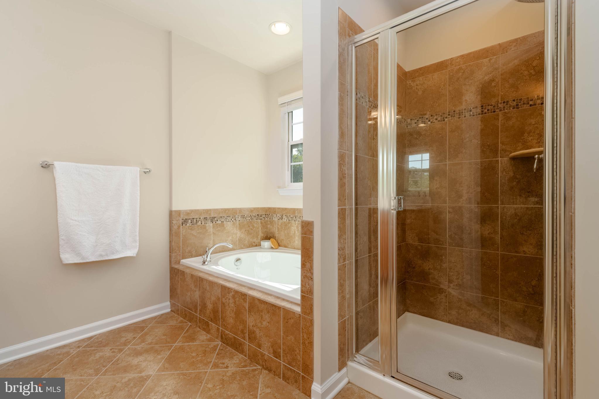 405 Signal Court, Unit 33 Bel Air, MD 21014 - Photo 23 of 43 a bathroom with a bathtub and a shower