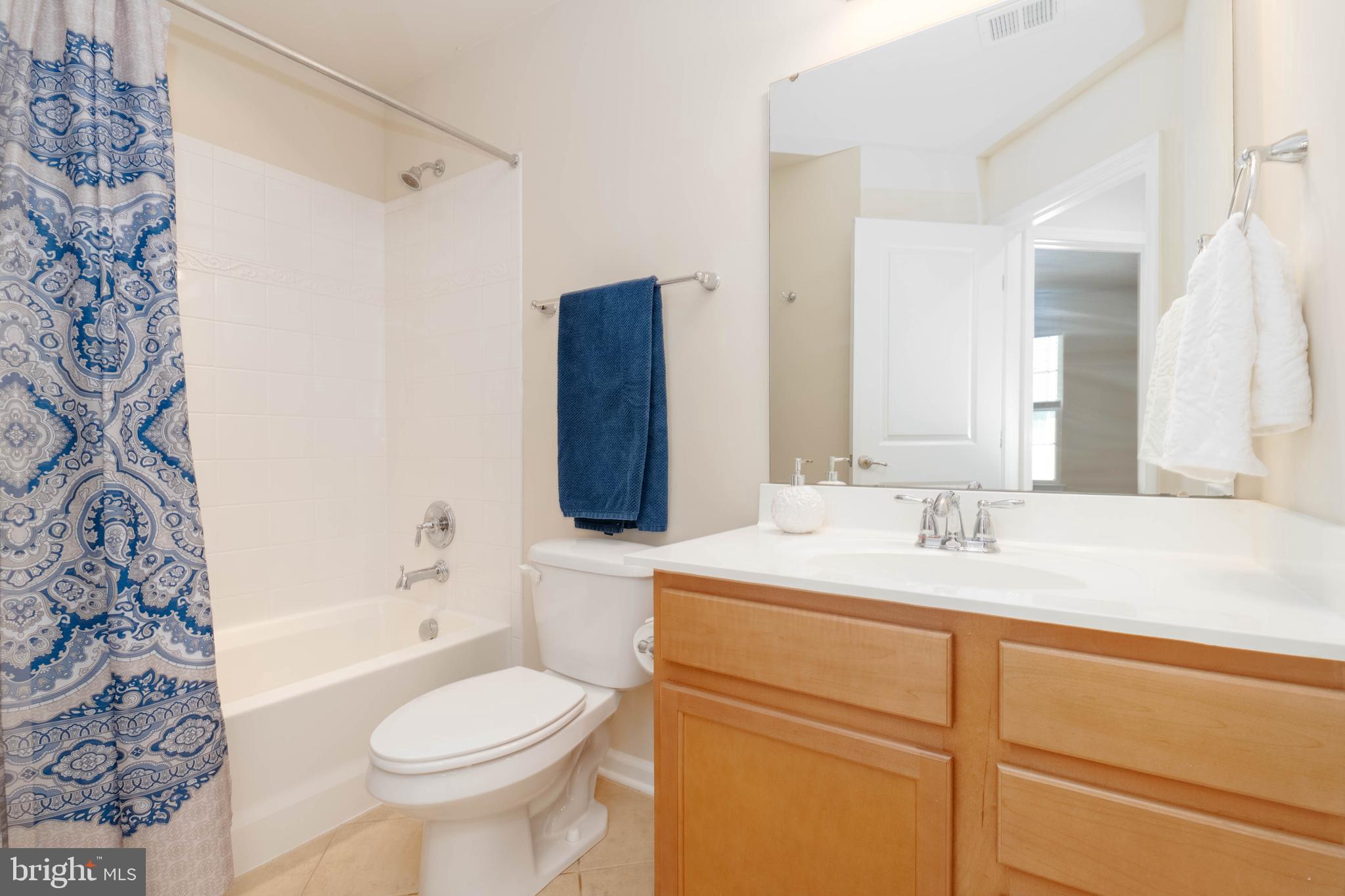 405 Signal Court, Unit 33 Bel Air, MD 21014 - Photo 31 of 43 a bathroom with a sink toilet and shower