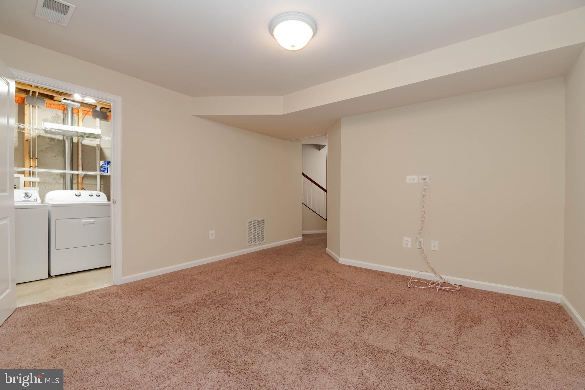 405 Signal Court, Unit 33 Bel Air, MD 21014 - Photo 33 of 43 an empty room with a empty space and windows