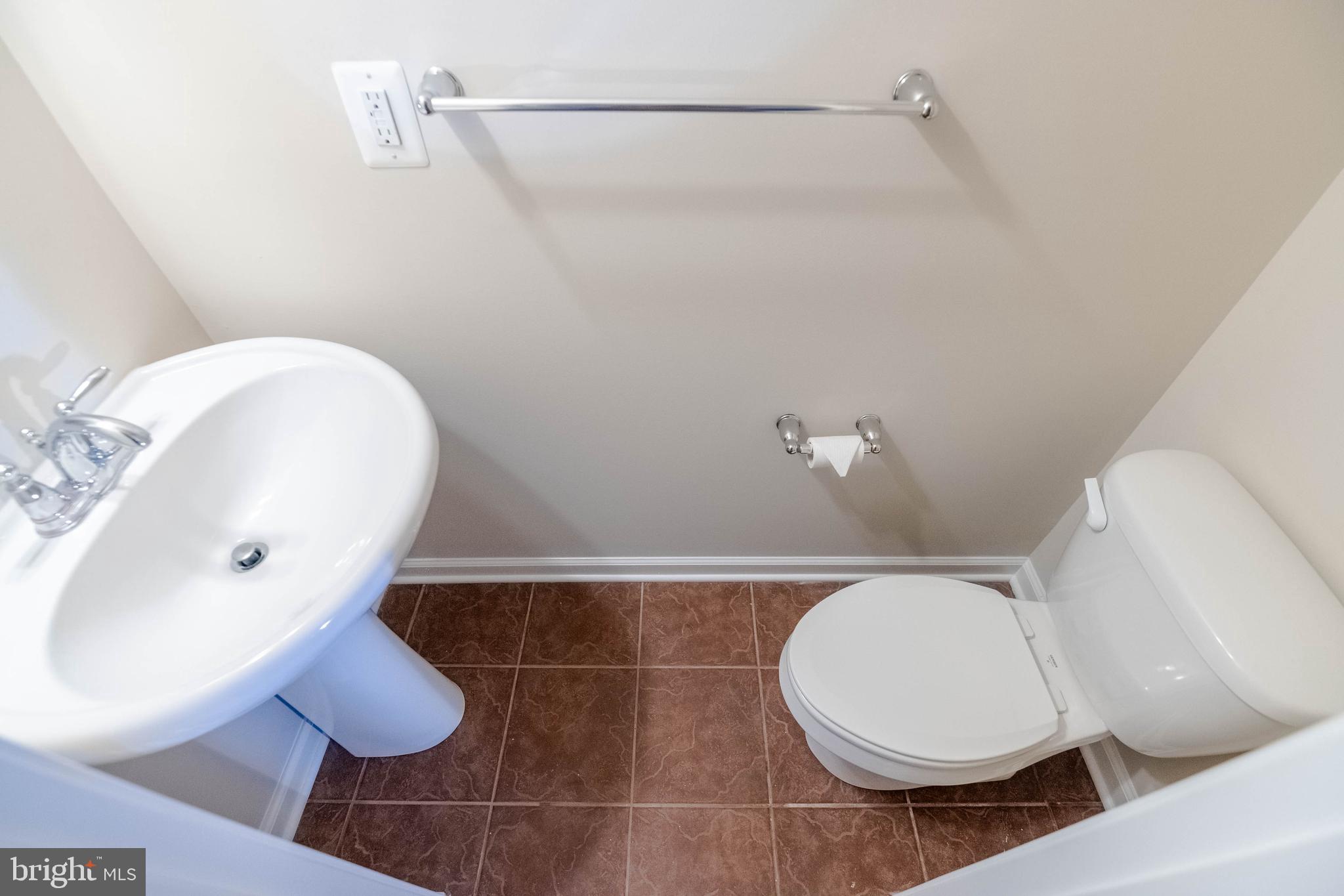 405 Signal Court, Unit 33 Bel Air, MD 21014 - Photo 36 of 43 a bathroom with a toilet and a sink