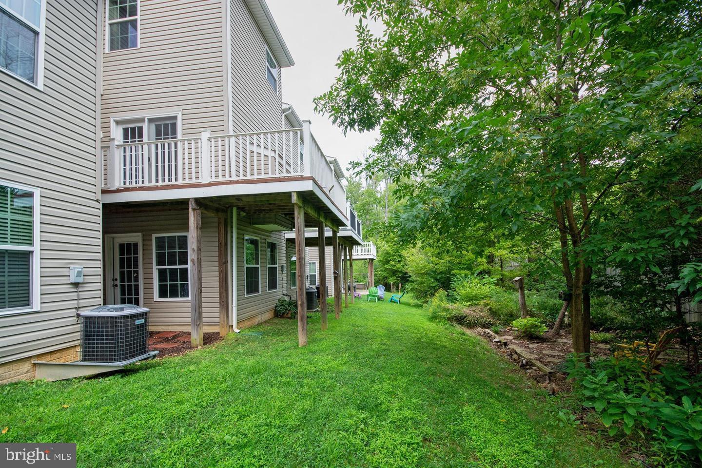 405 Signal Court, Unit 33 Bel Air, MD 21014 - Photo 38 of 43 a view of a house with a backyard and a porch