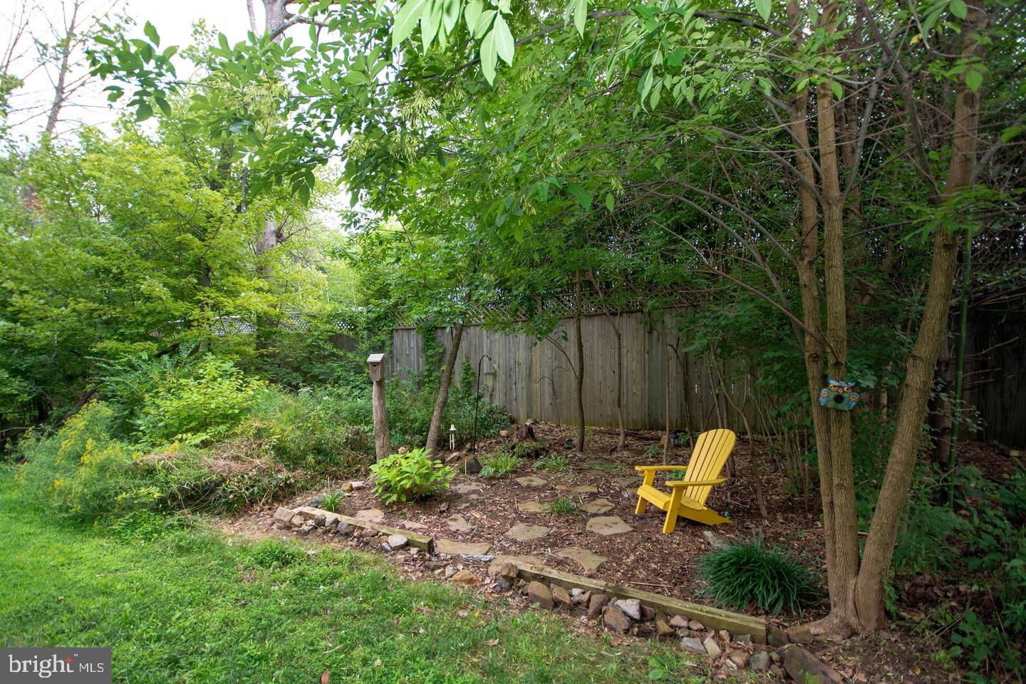 405 Signal Court, Unit 33 Bel Air, MD 21014 - Photo 39 of 43 a view of a backyard with plants and a slide