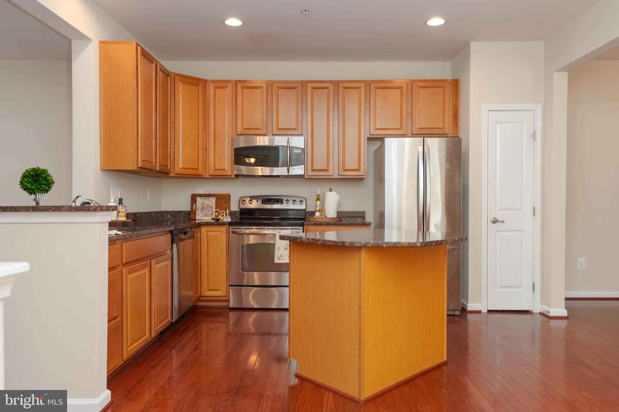 405 Signal Court, Unit 33 Bel Air, MD 21014 - Photo 9 of 43 a kitchen with stainless steel appliances a refrigerator sink and microwave