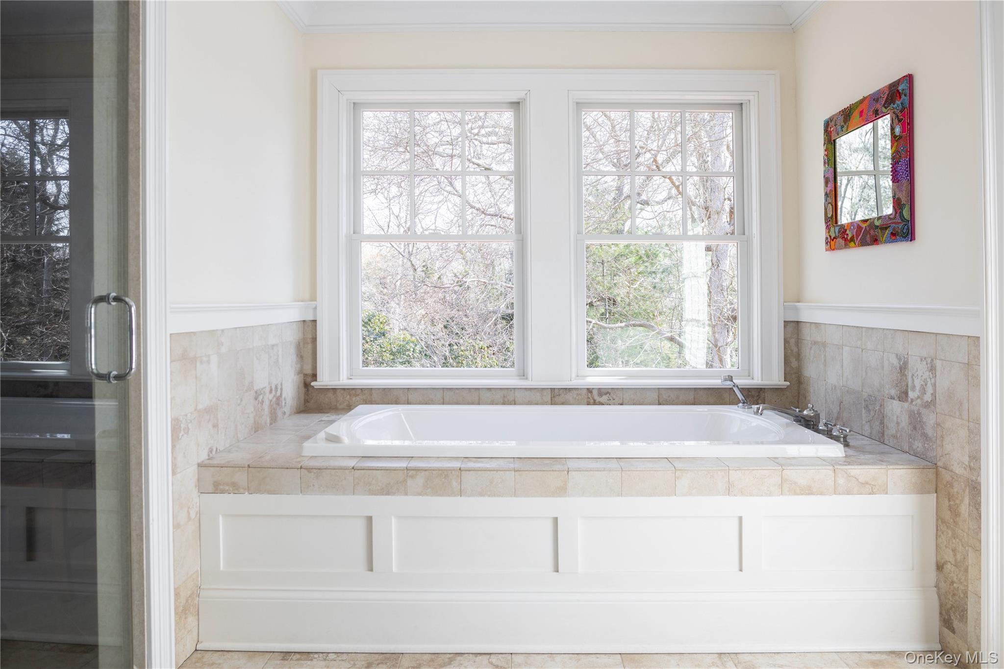 53 Cedar Lane West Remsenburg, NY 11960 - Photo 33 of 38 Bathroom with a garden tub and crown molding