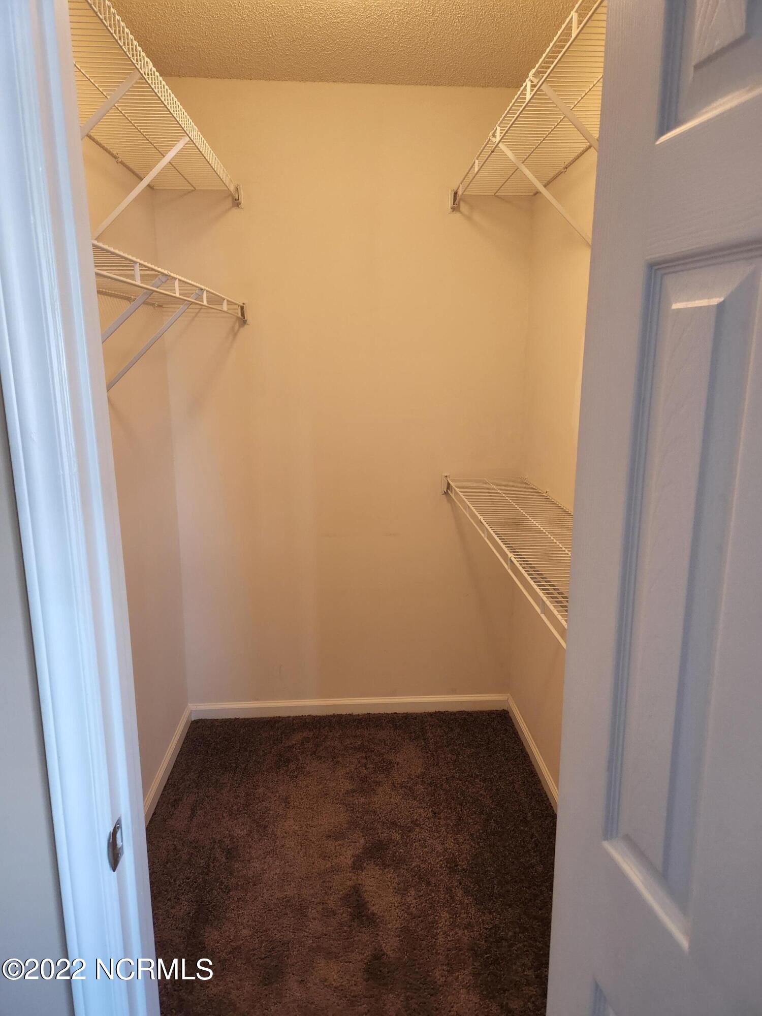 902 Spring Forest Road, Unit K8 Greenville, NC 27834 - Photo 11 of 18 Master closet