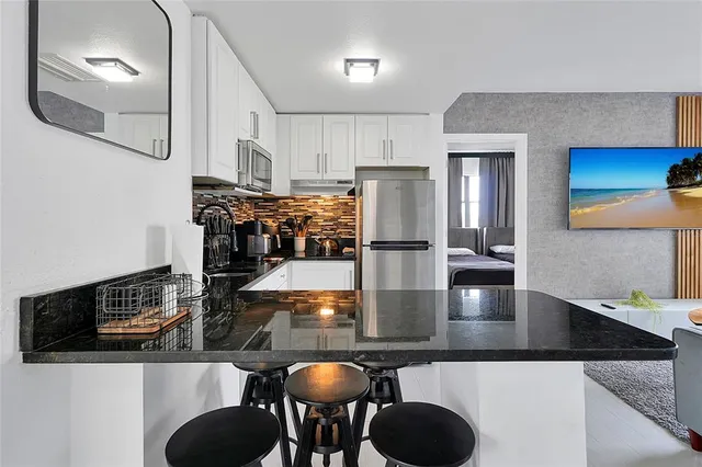 $290,000 | 6165 Carrier Drive, Unit 3701, Orlando, FL 32819