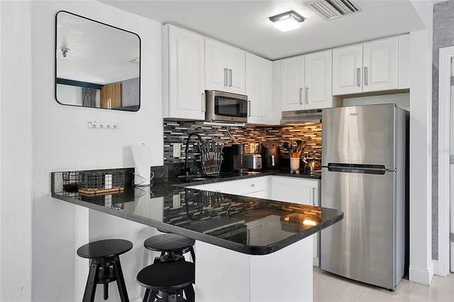 $290,000 | 6165 Carrier Drive, Unit 3701, Orlando, FL 32819