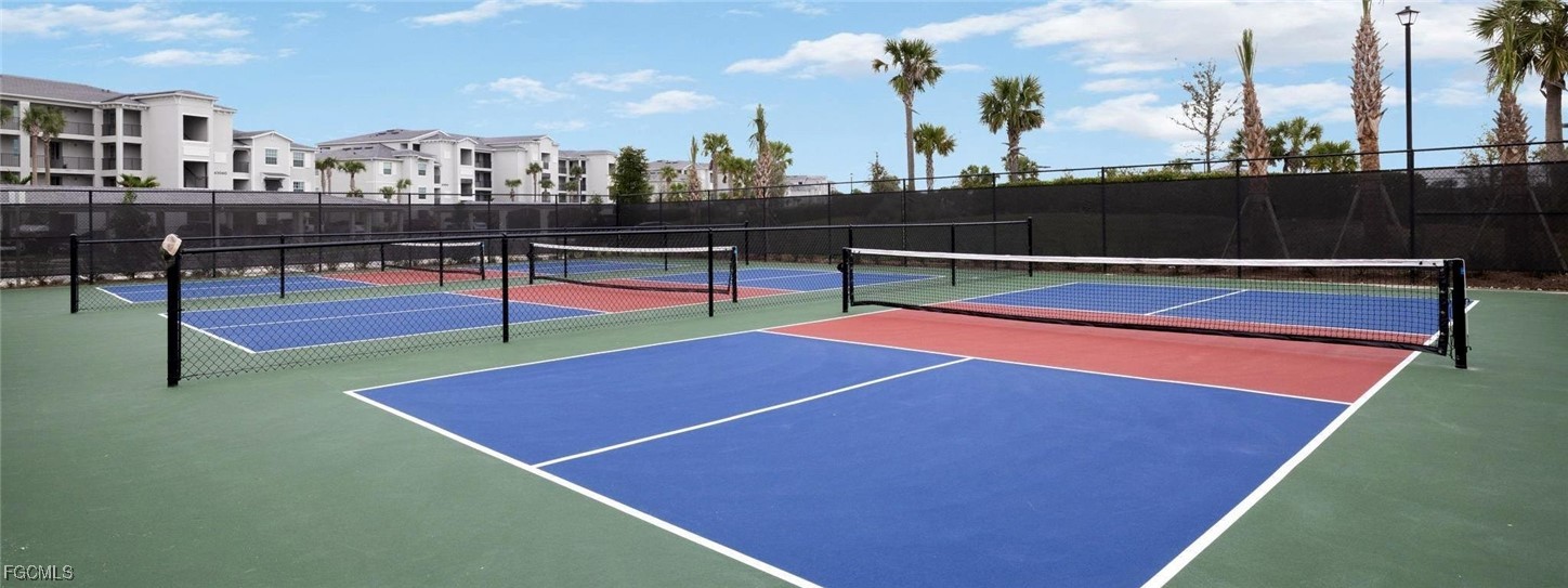 43985 Boardwalk Loop, Unit 2135 Punta Gorda, FL 33982 - Photo 18 of 48 a view of a tennis court