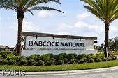 43985 Boardwalk Loop, Unit 2135 Punta Gorda, FL 33982 - Photo 22 of 48 a sign on the side of a building