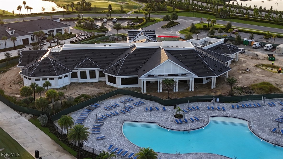 43985 Boardwalk Loop, Unit 2135 Punta Gorda, FL 33982 - Photo 27 of 48 an aerial view of a house with yard swimming pool and outdoor seating