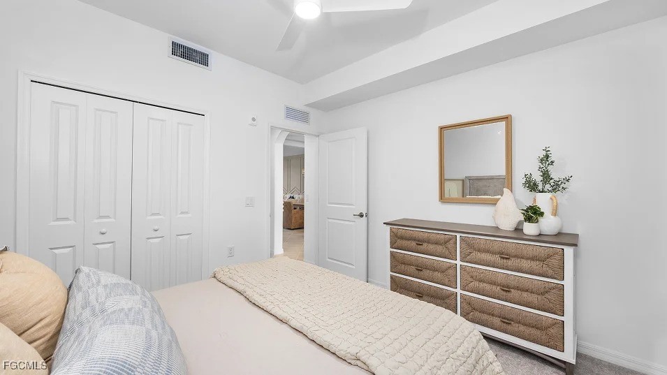 43985 Boardwalk Loop, Unit 2135 Punta Gorda, FL 33982 - Photo 3 of 48 a bedroom with a bed and a dresser