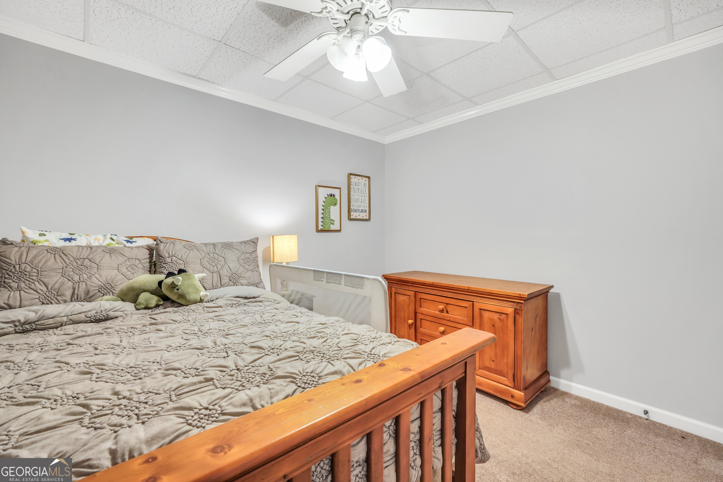 1964 East Lake Road McDonough, GA 30252 - Photo 57 of 99 a bedroom with a bed and a chandelier