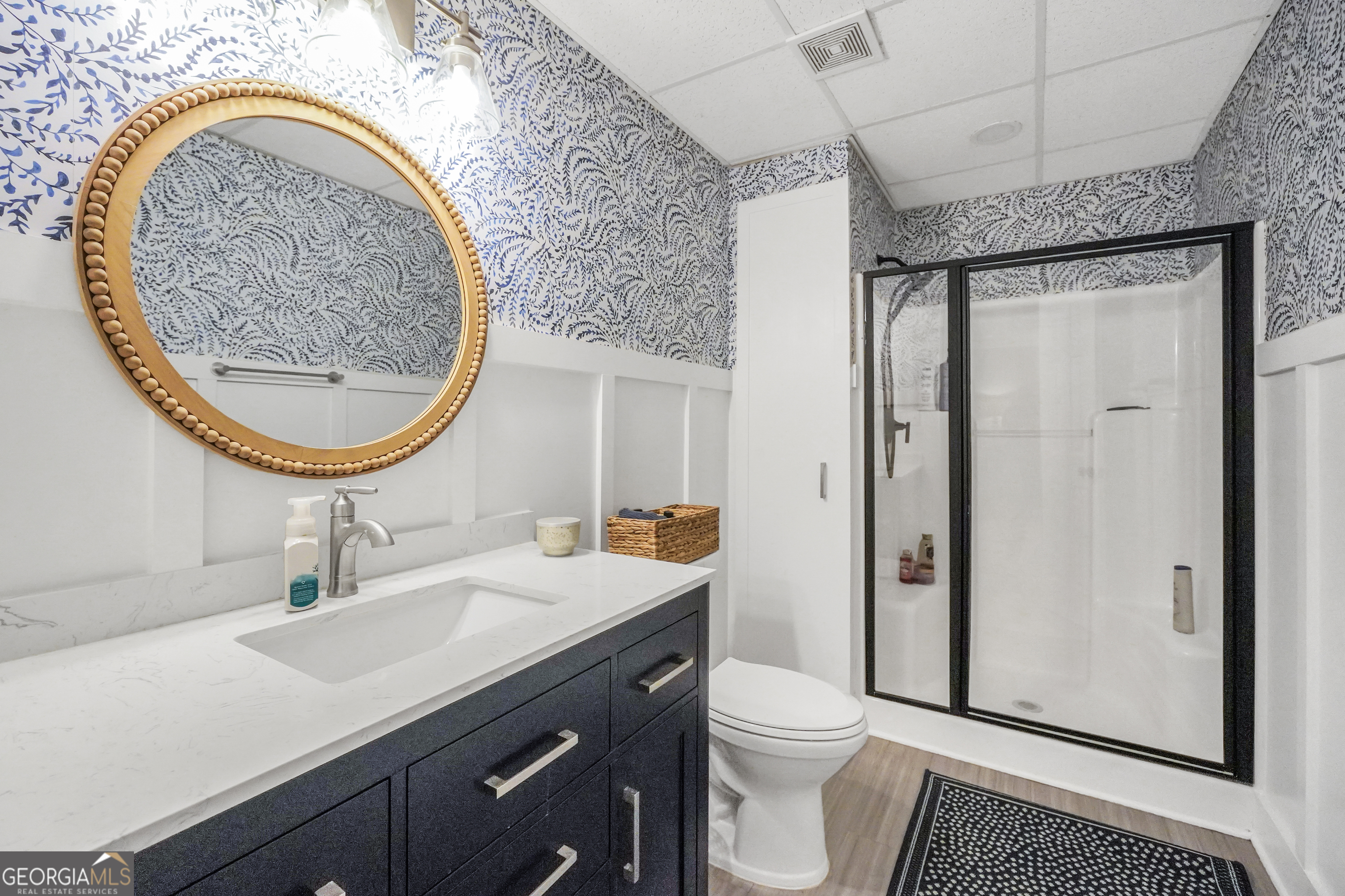 1964 East Lake Road McDonough, GA 30252 - Photo 58 of 99 a bathroom with a sink and a mirror