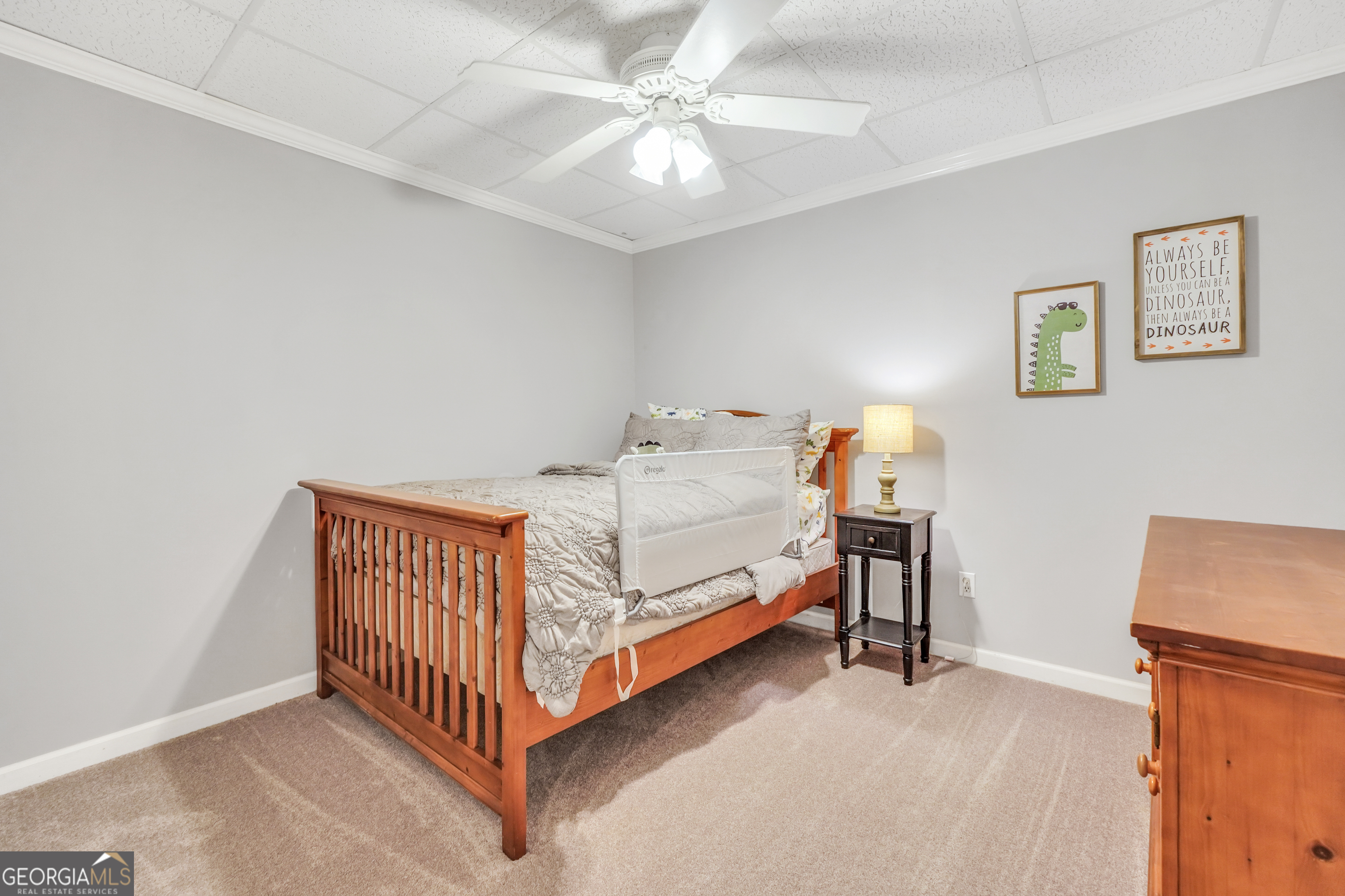 1964 East Lake Road McDonough, GA 30252 - Photo 60 of 99 a bedroom with a bed and a chandelier