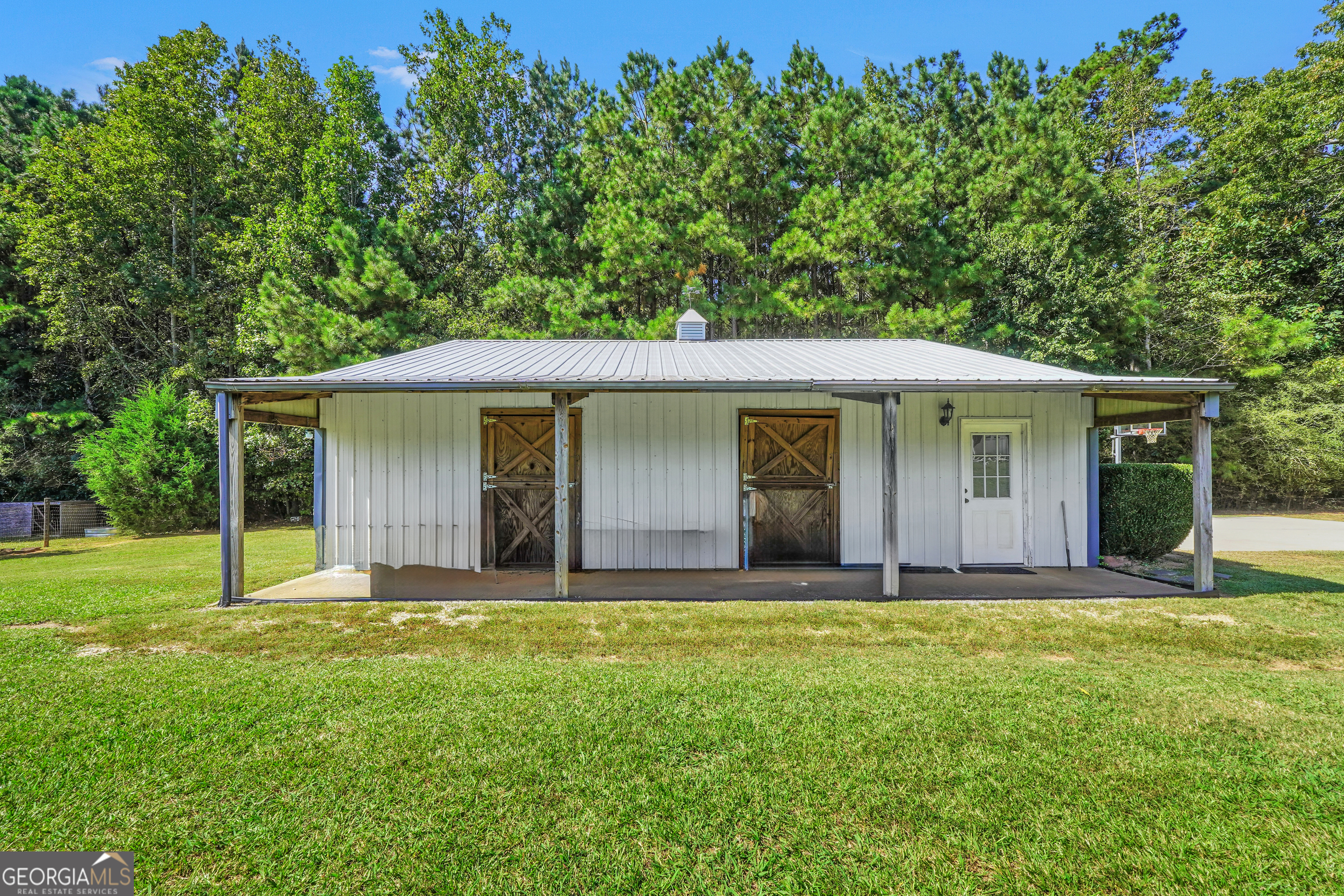 1964 East Lake Road McDonough, GA 30252 - Photo 86 of 99 a view of a house with a yard