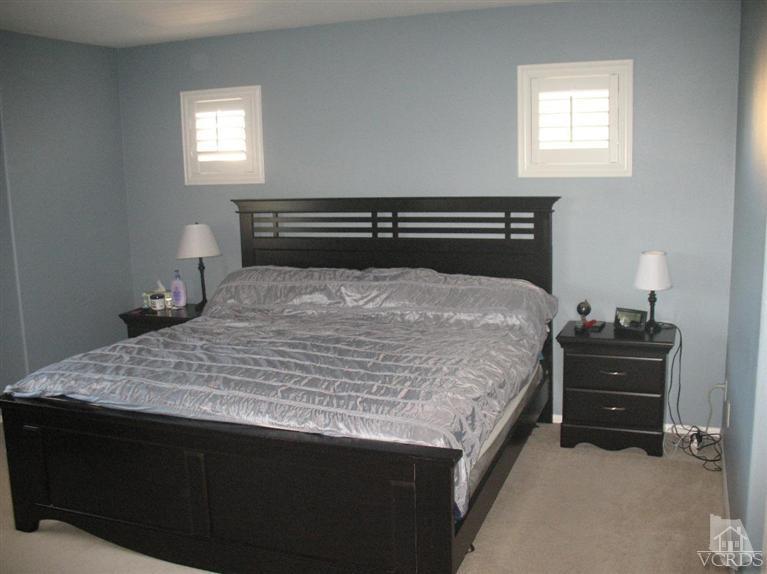 1420 Quincy Street Oxnard, CA 93033 - Photo 12 of 27 a bedroom with a bed and window