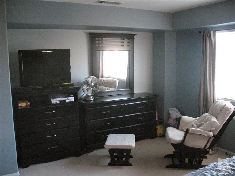 1420 Quincy Street Oxnard, CA 93033 - Photo 13 of 27 a room with a bed and a mirror