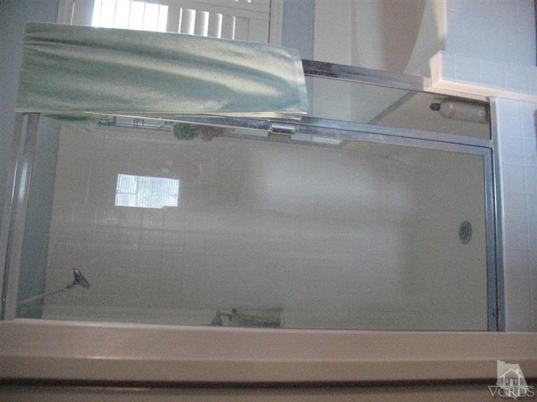 1420 Quincy Street Oxnard, CA 93033 - Photo 16 of 27 a bathroom with a bathtub