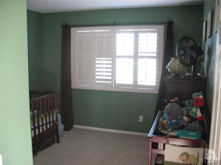 1420 Quincy Street Oxnard, CA 93033 - Photo 19 of 27 a room with cabinets and a window