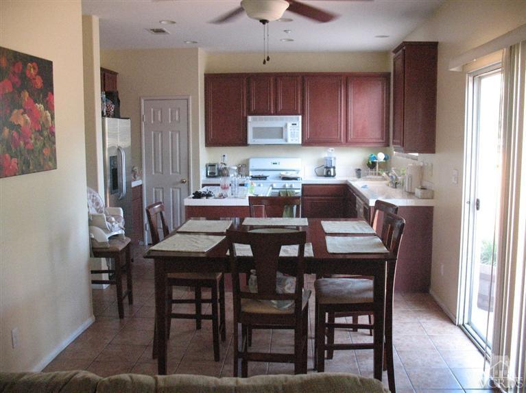 1420 Quincy Street Oxnard, CA 93033 - Photo 4 of 27 a view of a dining room with furniture