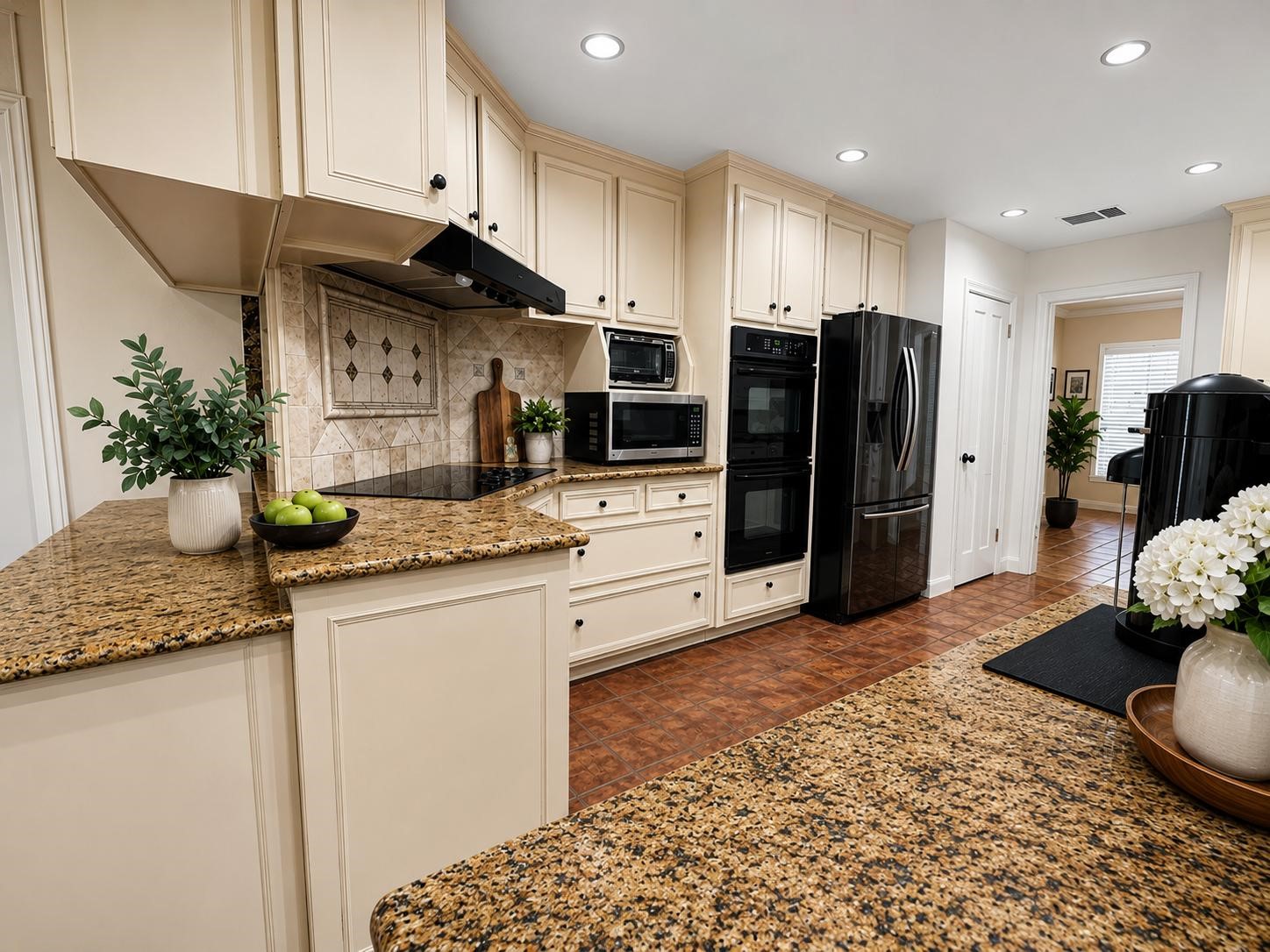 6514 Misty Springs Lane Spring, TX 77379 - Photo 7 of 49 a kitchen with stainless steel appliances kitchen island granite countertop a refrigerator and a stove top oven
