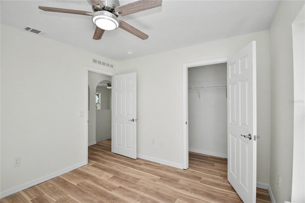 4948 Cromey Road North Port, FL 34288 - Photo 23 of 30 a view of an empty room with wooden floor