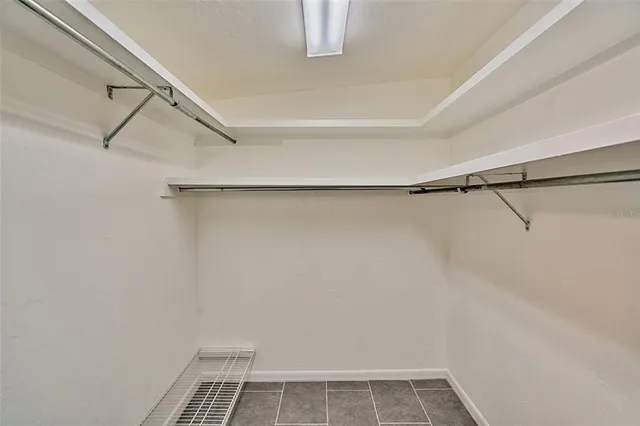 a view of a room with racks on the wall