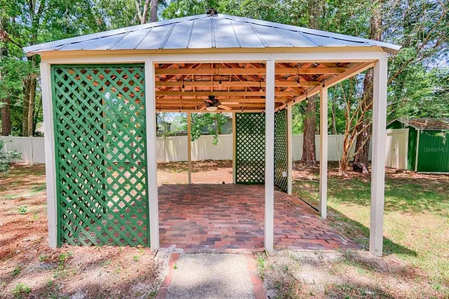 a view of a porch with a backyard
