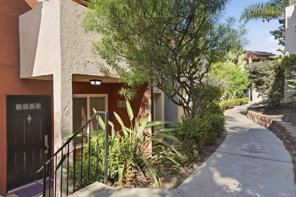 4455 Home Avenue, Unit 2 San Diego, CA 92105 - Photo 2 of 28 a couple of cars parked in front of house