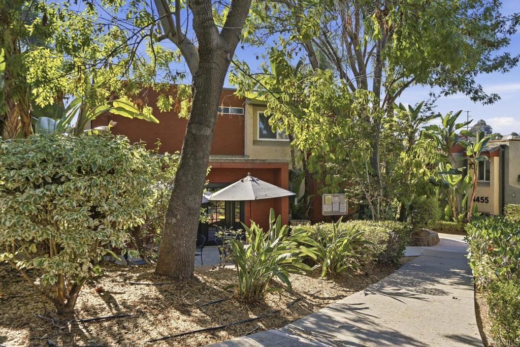 4455 Home Avenue, Unit 2 San Diego, CA 92105 - Photo 24 of 28 a view of a chairs and table in a backyard