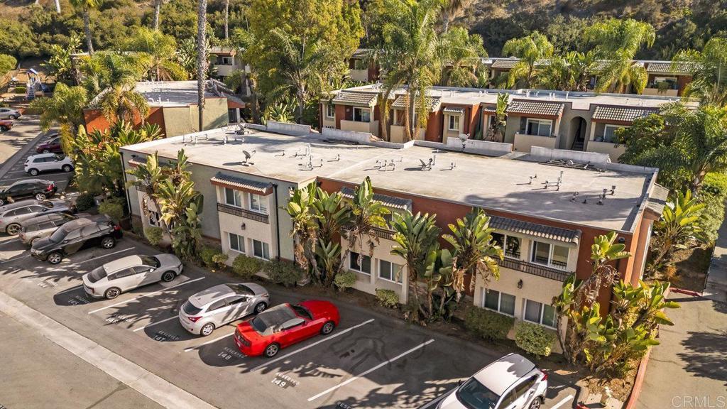4455 Home Avenue, Unit 2 San Diego, CA 92105 - Photo 26 of 28 a view of a patio with table and chairs with potted plants