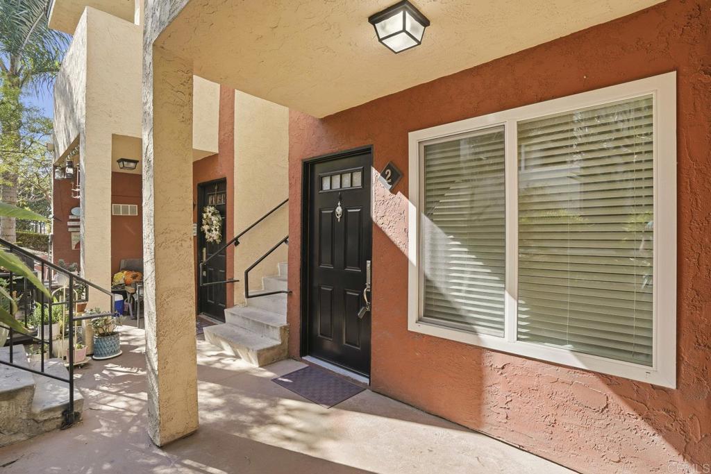 4455 Home Avenue, Unit 2 San Diego, CA 92105 - Photo 4 of 28 a view of a brick house with a large windows