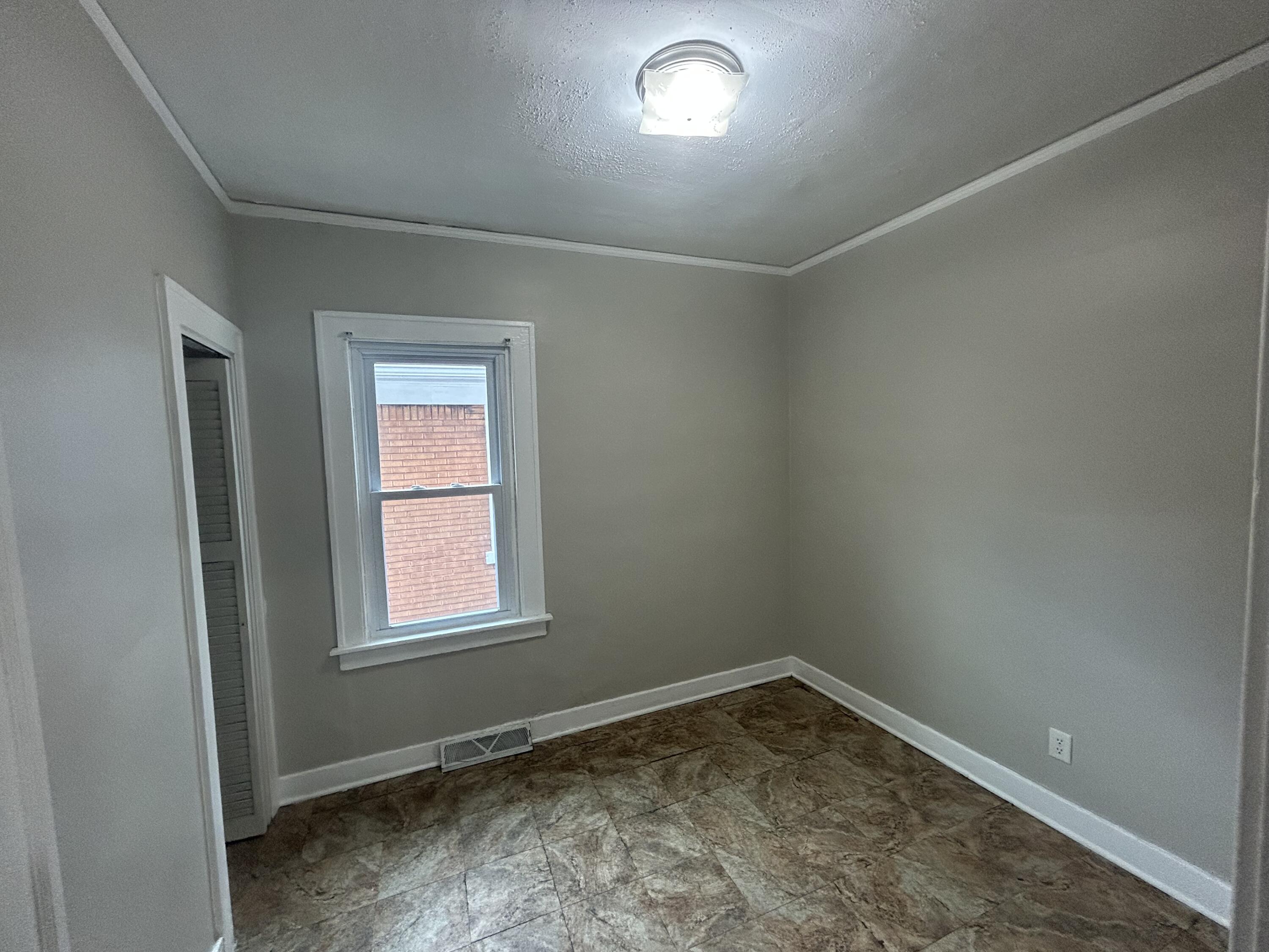 3661 Connecticut Street Gary, IN 46409 - Photo 11 of 17 an empty room with a window
