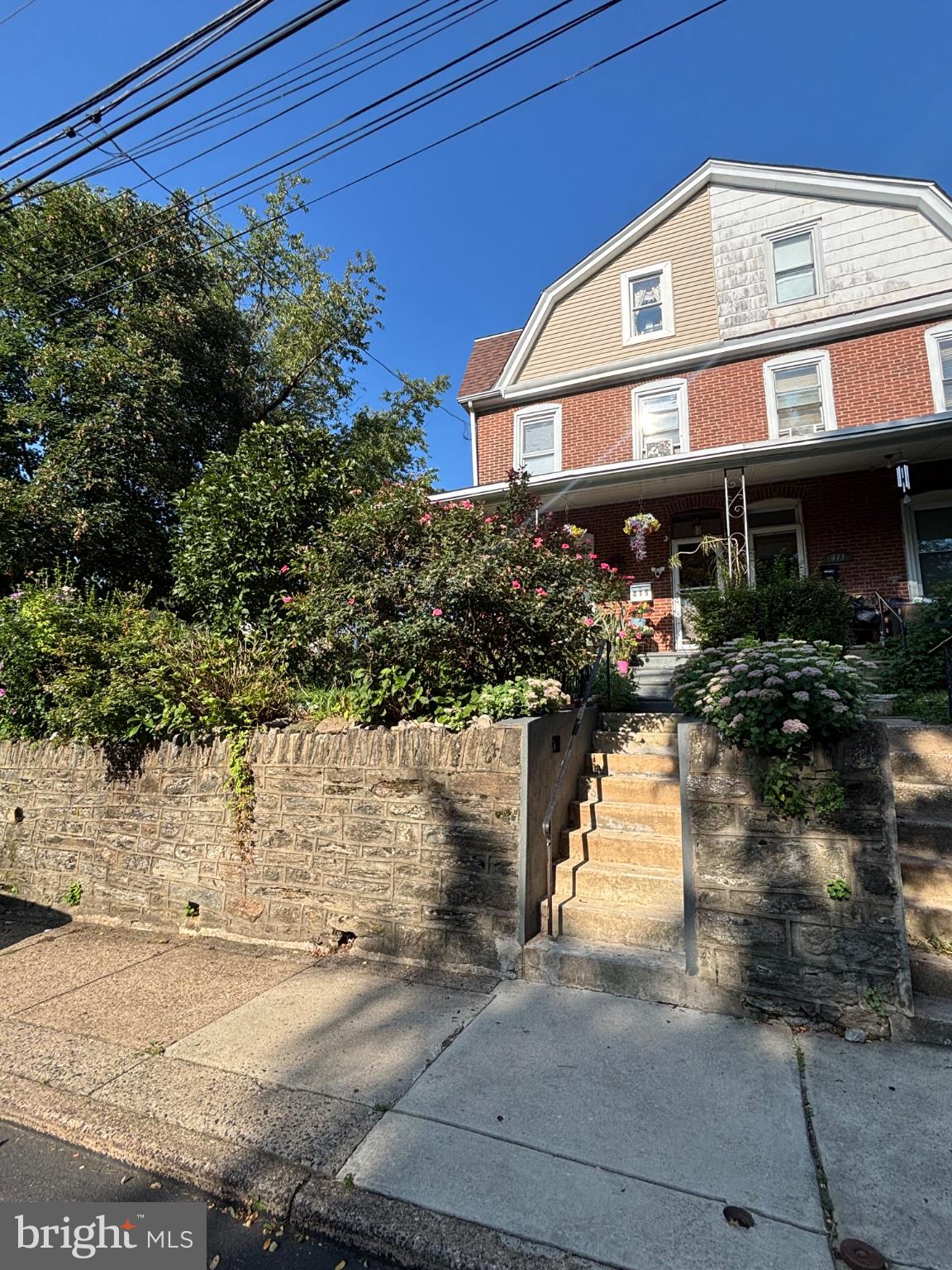 415 Valley Road Elkins Park, PA 19027 - Photo 1 of 17 Charming home with lush greenery.