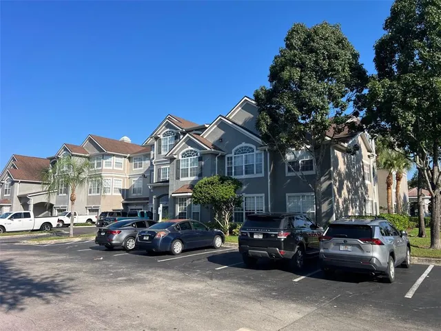 a car parked in front of a house