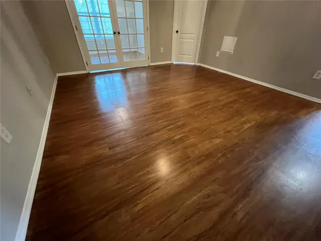 wooden floor in a hall with an entryway