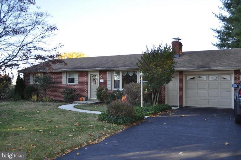 4807 Dave Rill Road Hampstead, MD 21074 - Photo 1 of 25 front view of a house with a yard