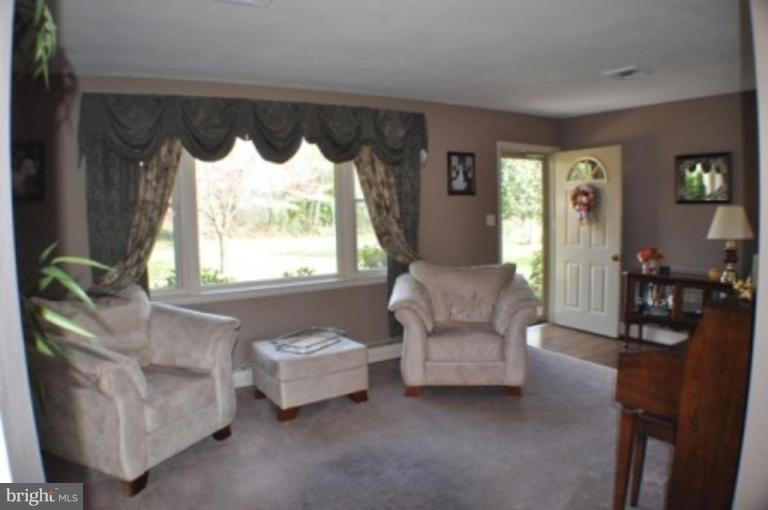 4807 Dave Rill Road Hampstead, MD 21074 - Photo 23 of 25 a living room with furniture and a large window