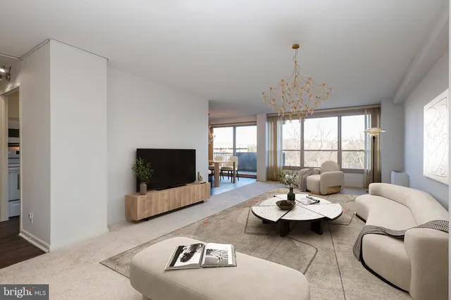 a living room with furniture and window