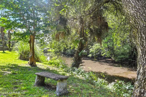 a view of a bench in a garden