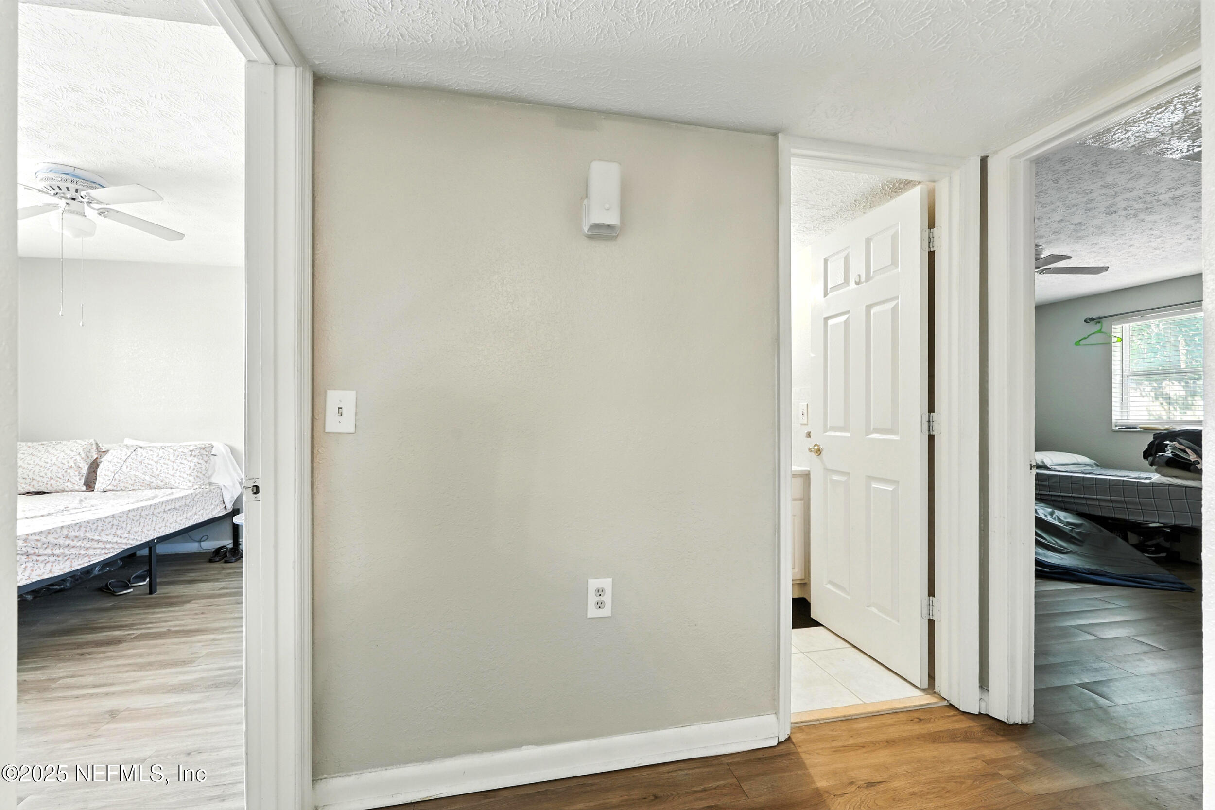 4836 Atlantic Boulevard, Unit 104 Jacksonville, FL 32207 - Photo 9 of 24 Hall to both bedrooms