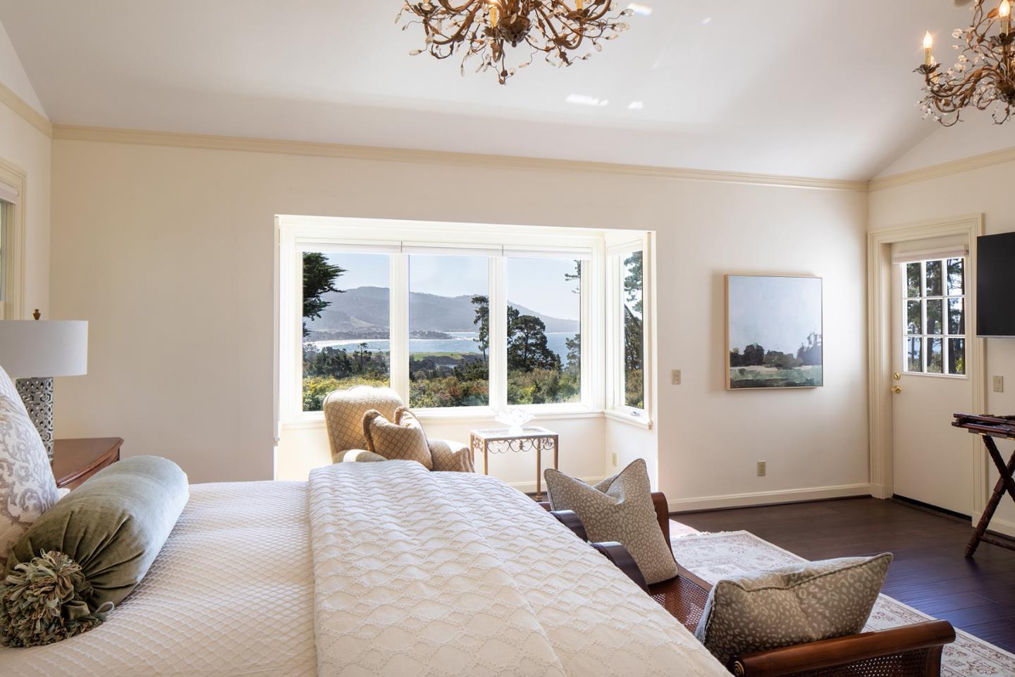 1476 Bonifacio Road Pebble Beach, CA 93953 - Photo 12 of 39 a bedroom with furniture and a large window