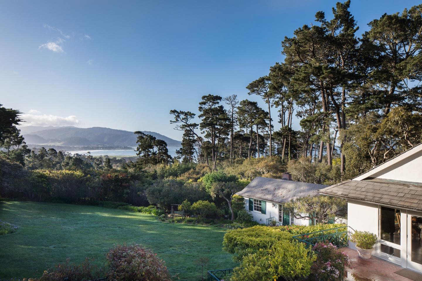 1476 Bonifacio Road Pebble Beach, CA 93953 - Photo 15 of 39 a view of a house with a yard