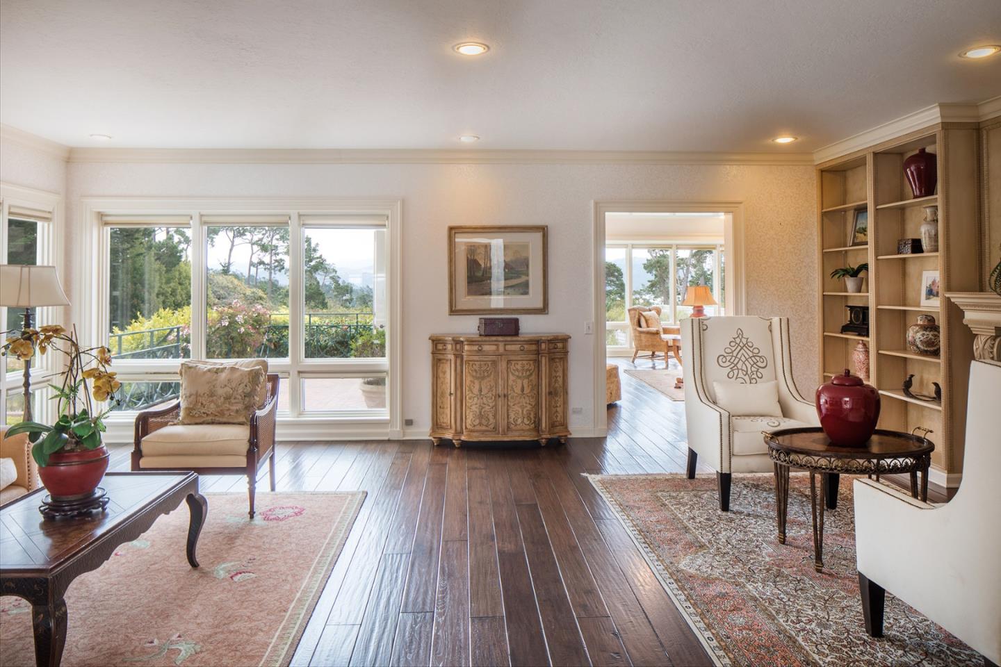 1476 Bonifacio Road Pebble Beach, CA 93953 - Photo 20 of 39 a living room with furniture and a wooden floor