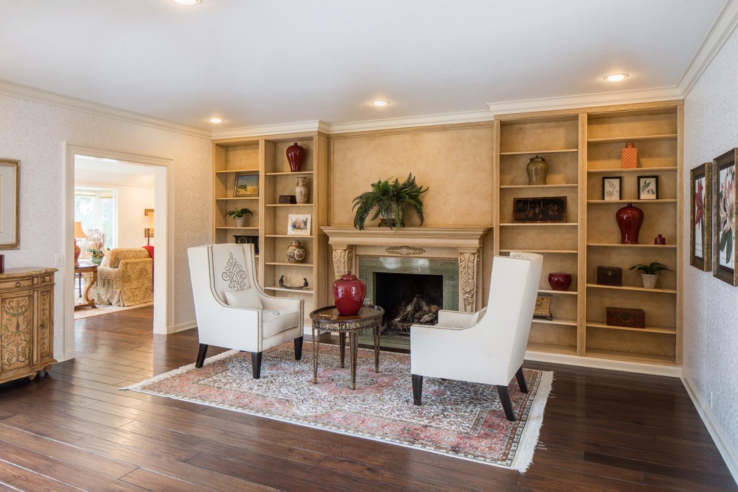 1476 Bonifacio Road Pebble Beach, CA 93953 - Photo 21 of 39 a living room with furniture and a fireplace