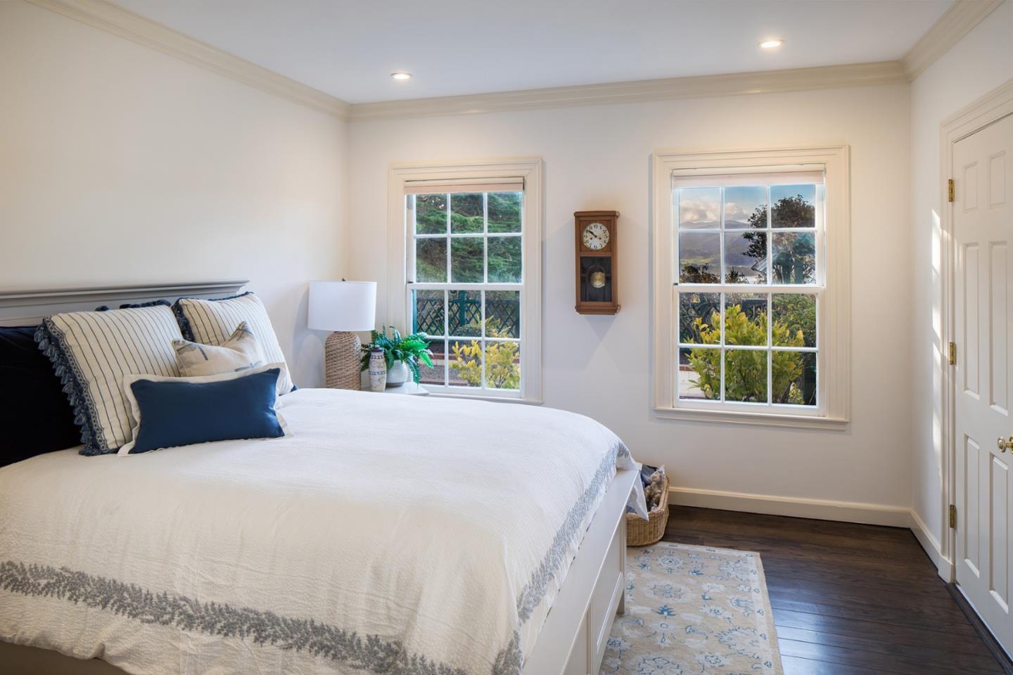 1476 Bonifacio Road Pebble Beach, CA 93953 - Photo 24 of 39 a bedroom with bed and a window