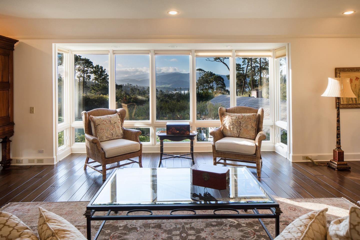 1476 Bonifacio Road Pebble Beach, CA 93953 - Photo 3 of 39 a living room with furniture and a floor to ceiling window