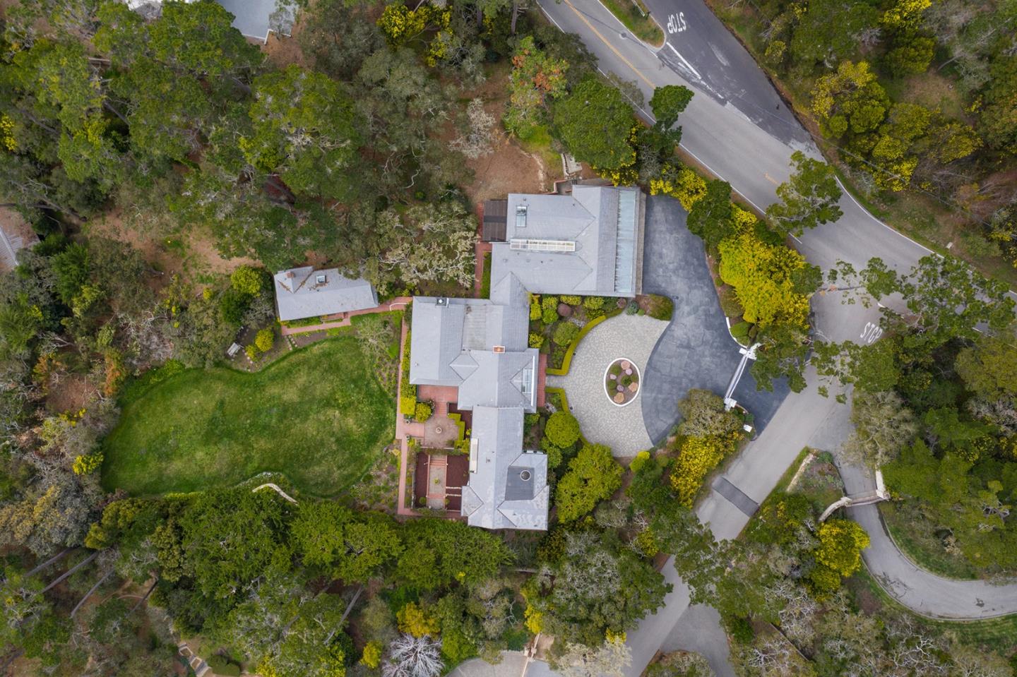 1476 Bonifacio Road Pebble Beach, CA 93953 - Photo 38 of 39 an aerial view of residential house with outdoor space and parking
