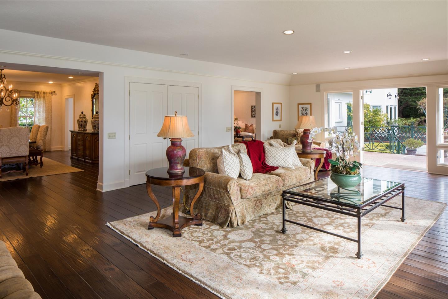1476 Bonifacio Road Pebble Beach, CA 93953 - Photo 6 of 39 a living room with furniture and a wooden floor