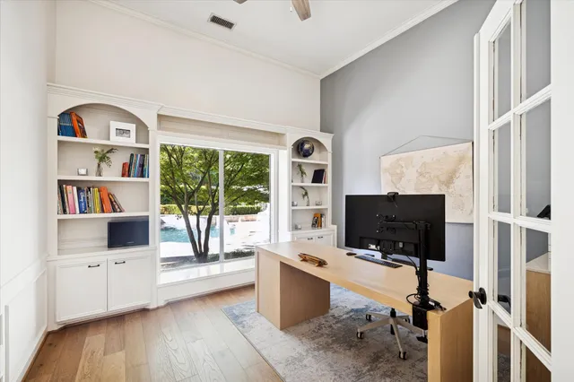 a living room with fireplace furniture and a flat screen tv